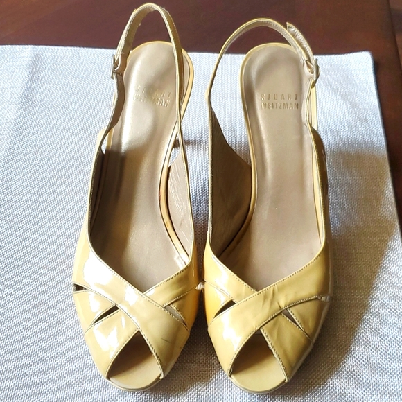 Stuart Weitzman Shoes - Stuart Weitzmsn sling back heels. Color is a yellowish tan.